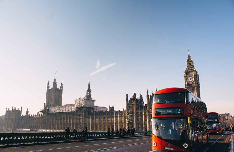 Buses travelling over Westminster Bridge in London 