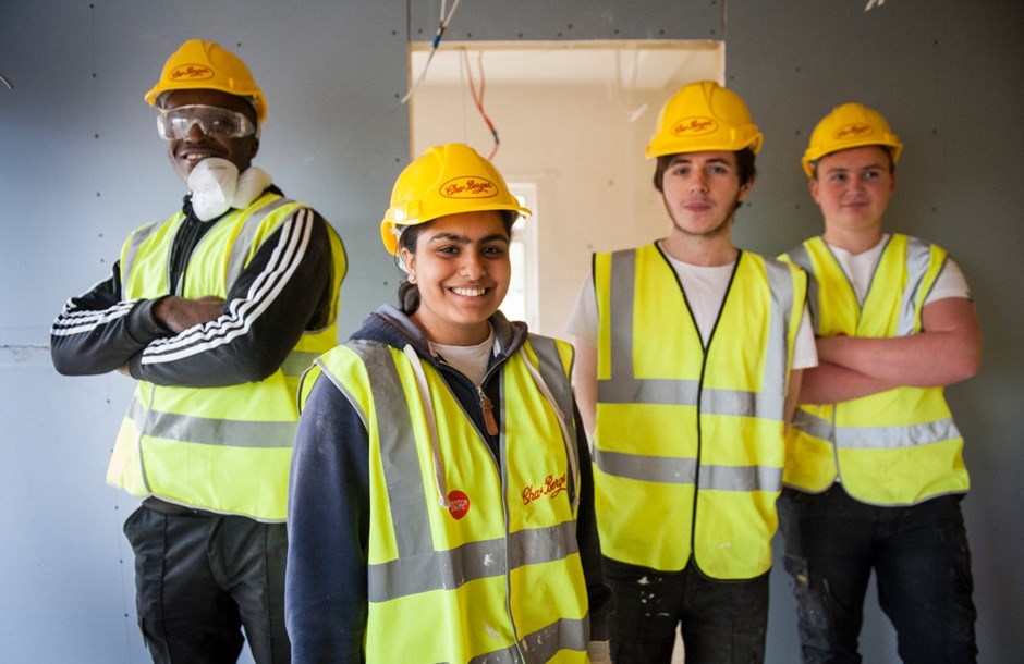 Four apprentices in hi-vis and hard hats